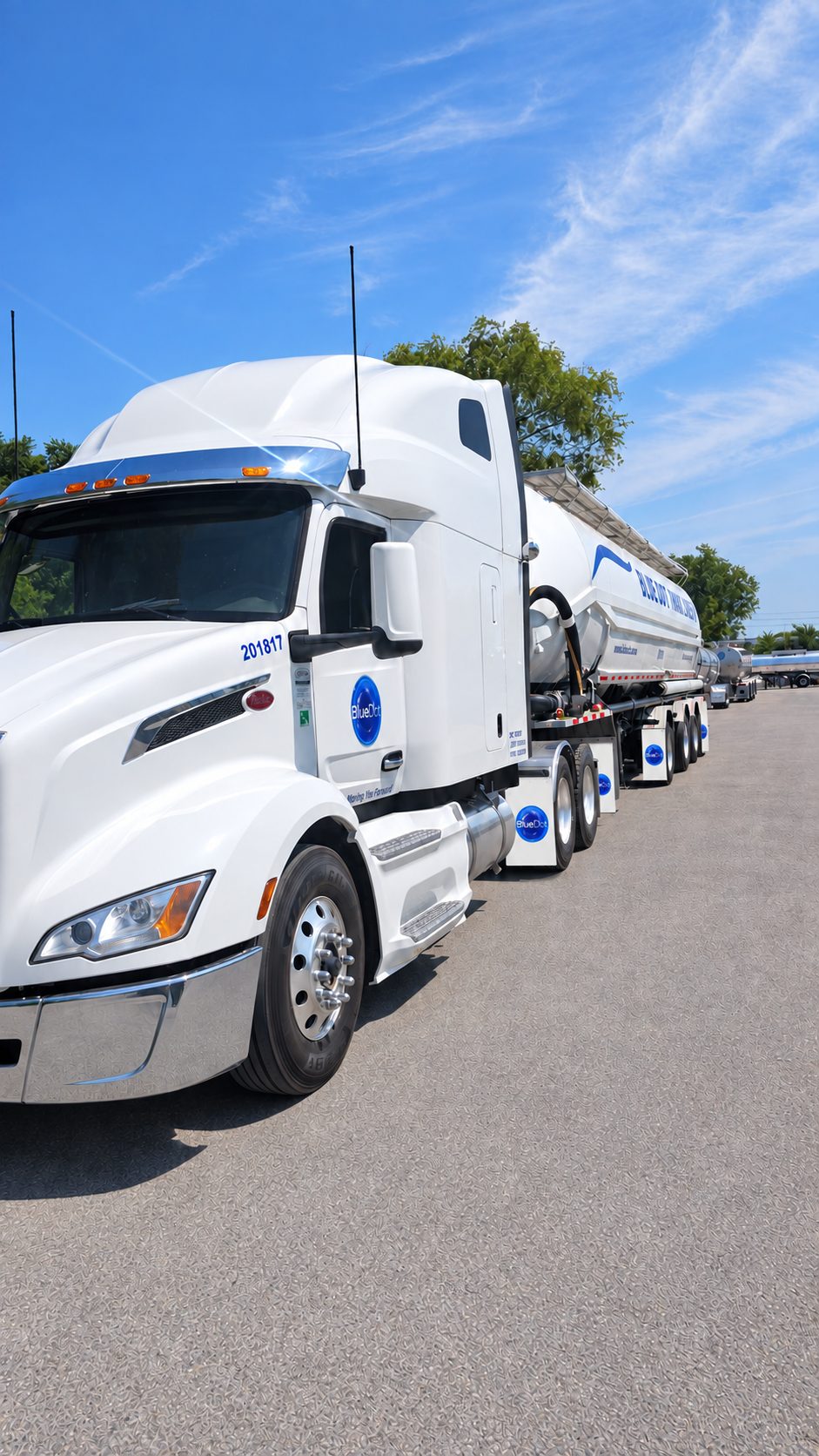White Blue Dot Tank Lines tractor with a dry bulk tanker